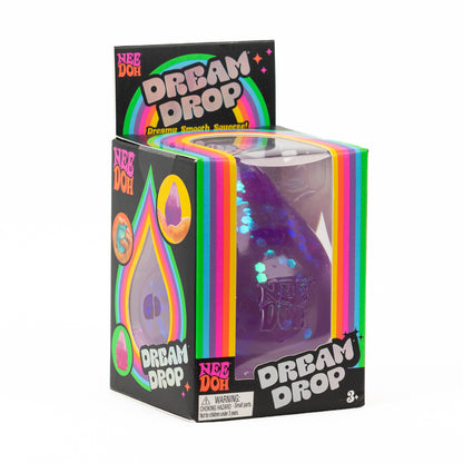 NeeDoh Dream Drop - Purple Glitter, angled front view of retail packaging.