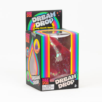 NeeDoh Dream Drop - Pink Glitter, angled front view of retail packaging.