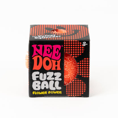 NeeDoh Fuzz Ball Flower Power - Orange, front of retail packaging.
