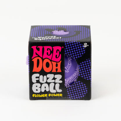 NeeDoh Fuzz Ball Flower Power - Purple, front of retail packaging.