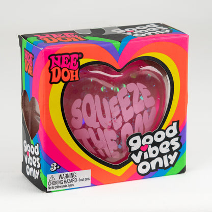 NeeDoh Good Vibes - Pink - Squeeze The Day, angled front view of retail packaging.