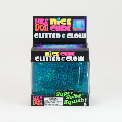 NeeDoh Nice Cube Glitter Glow - Blue, front of retail packaging.