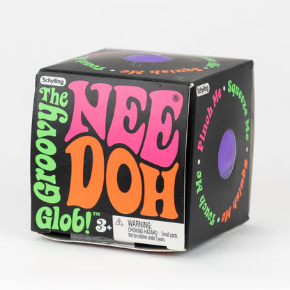 NeeDoh Groovy Glob Classic - Purple, angled front view of retail packaging.