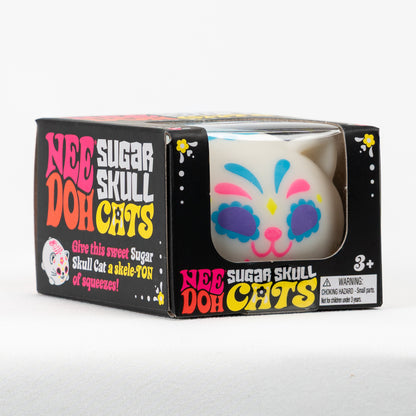 NeeDoh Sugar Skull Doh Cats - Blue, angled front view of retail packaging.