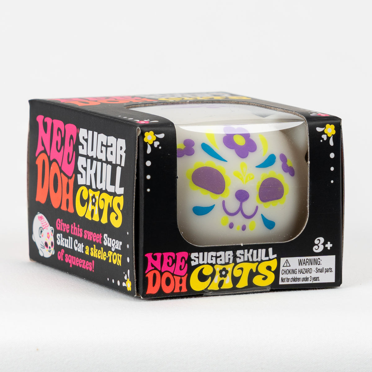 NeeDoh Sugar Skull Doh Cats - Purple, angled front view of retail packaging.