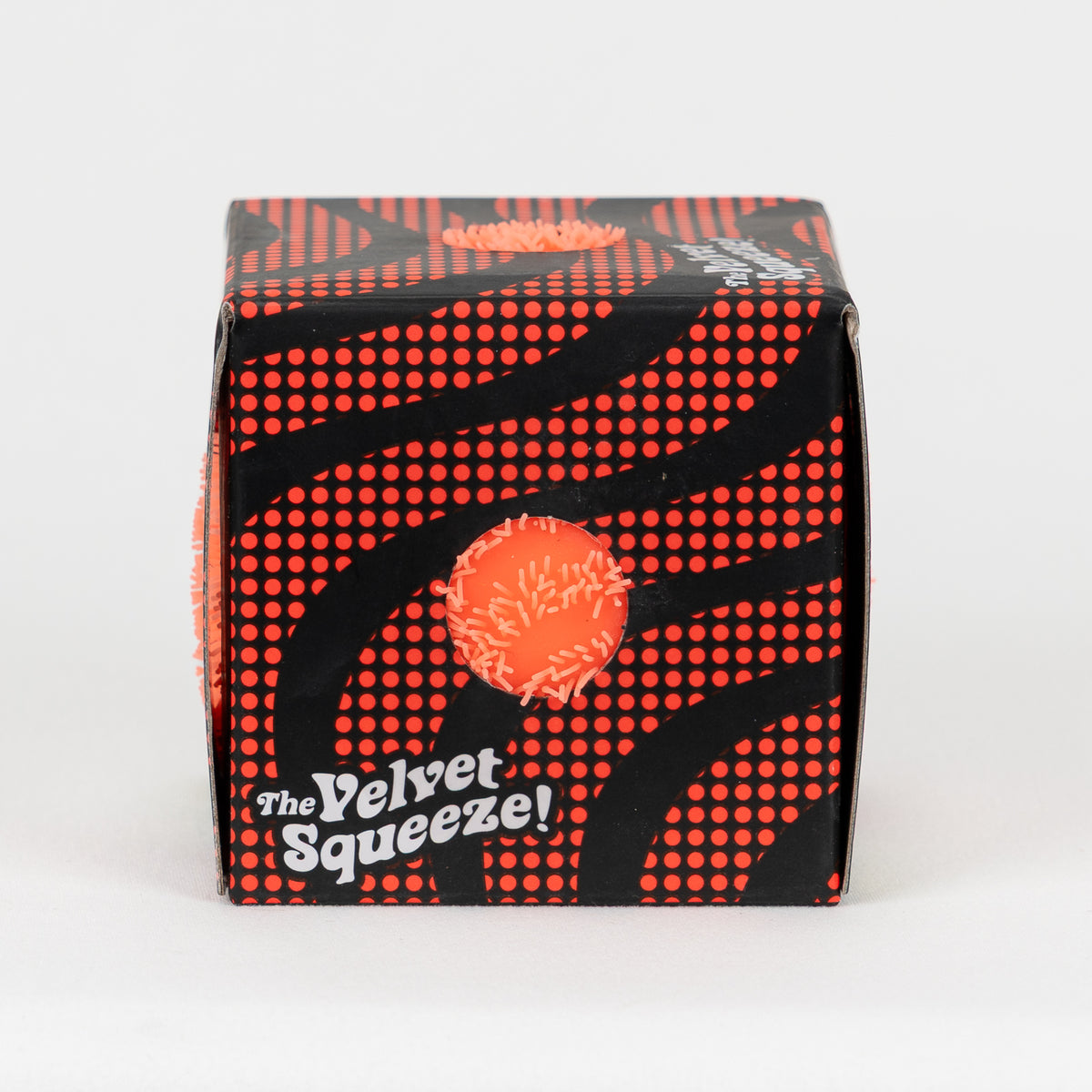NeeDoh Fuzz Ball Wonder Waves - Orange, side package window.