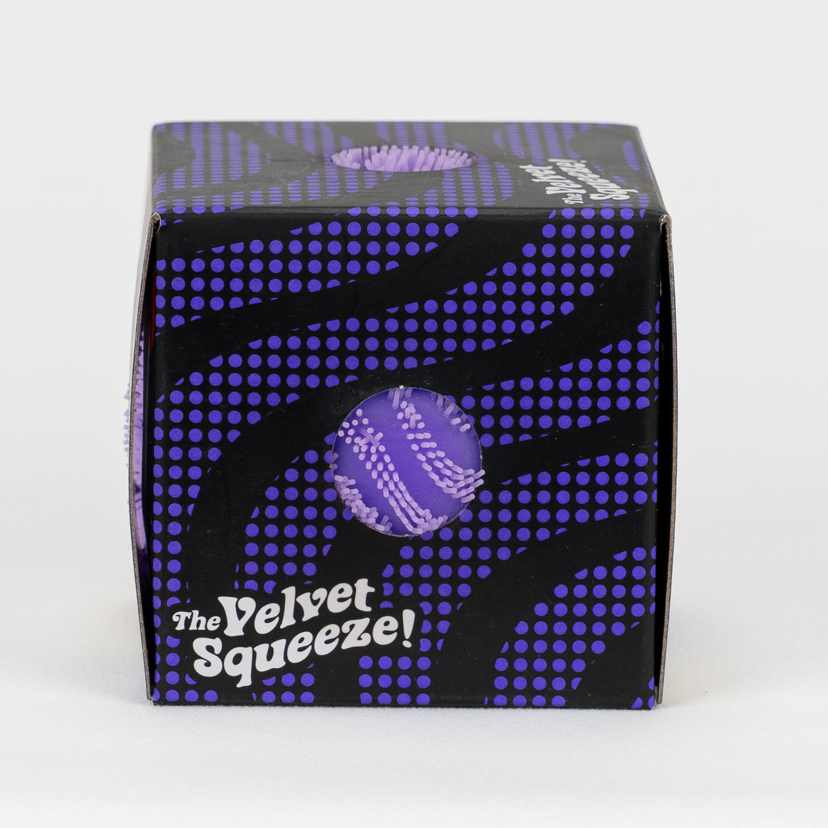 NeeDoh Fuzz Ball Wonder Waves - Purple, side package window.